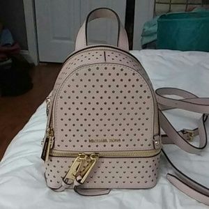Michael kors mini back pack in pale pink